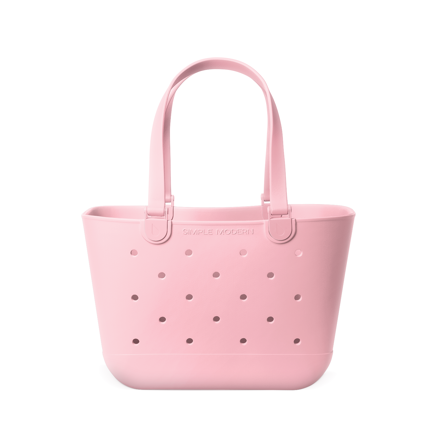 Soft pale pink tote bag with mauve perforated detailing across the front for subtle contrast