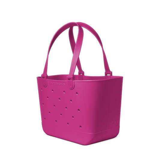Vibrant magenta hot pink tote bag displayed against white background