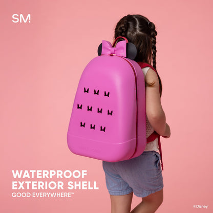 Hot pink Disney kids backpack with waterproof shell displayed against soft pink background