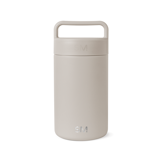 Beige cylindrical jar with matching lid on white background